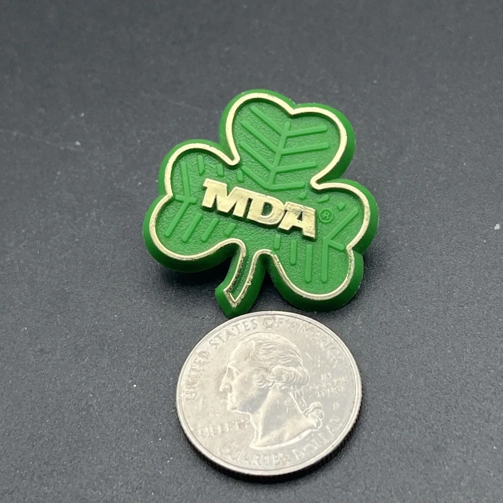 MDA Muscular Dystrophy Association Shamrock Plastic Lapel Hat Pin‎